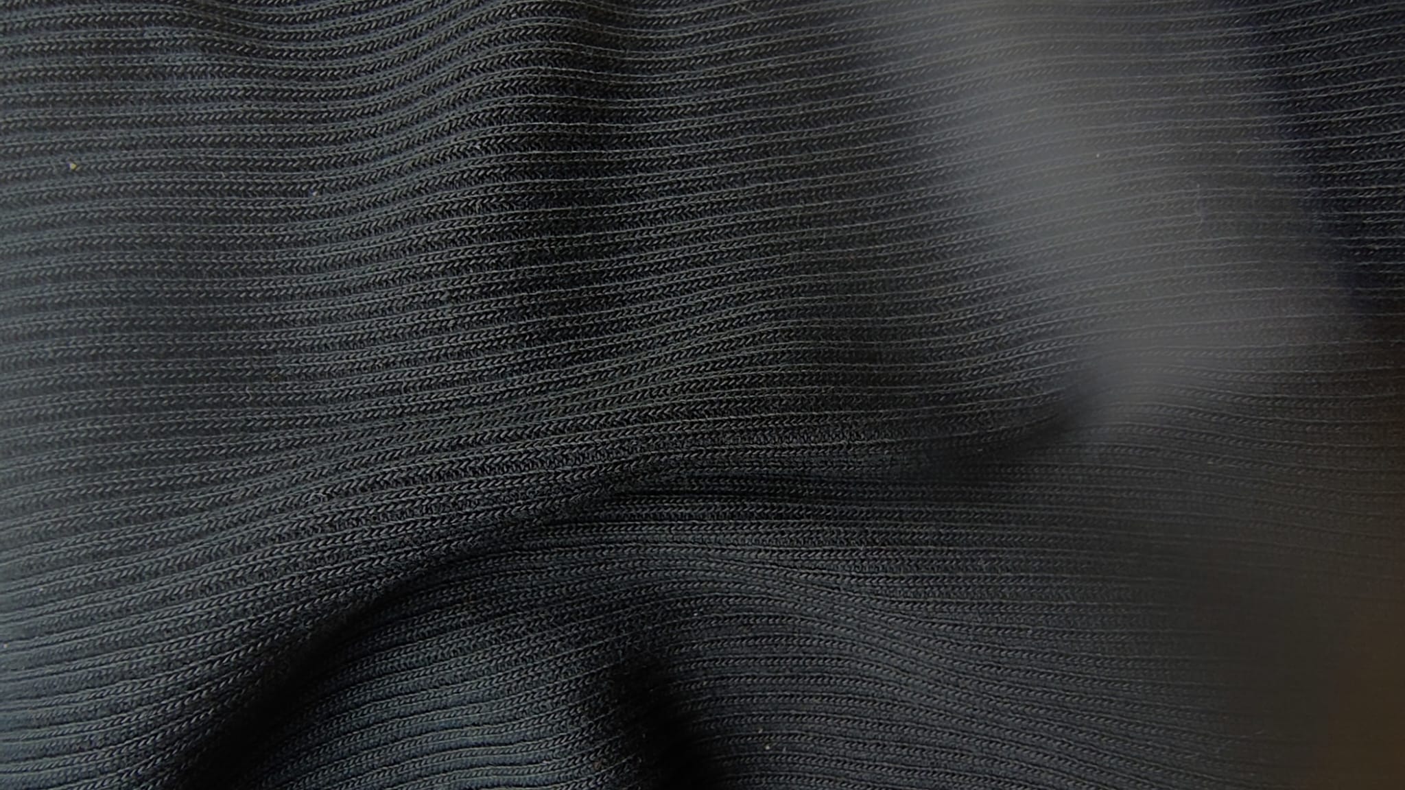 Material: zwarte jersey rib